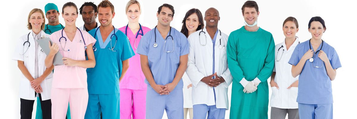 A group of doctors and nurses standing together.